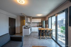 Appartements Le Saint Exupery - T3 Centre Ville Avec Balcon + Parking Gratuit : photos des chambres