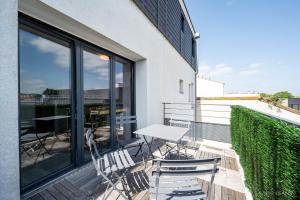 Appartements Le Saint Exupery - T3 Centre Ville Avec Balcon + Parking Gratuit : photos des chambres