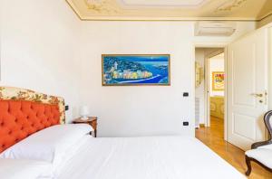 Bilocale affrescato con box privato & spiaggia a 150m