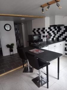 Appartements Le Village : photos des chambres
