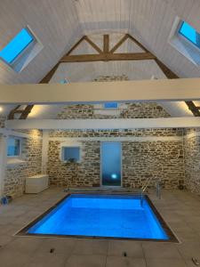Maisons de vacances Gite avec piscine interieure privee : photos des chambres