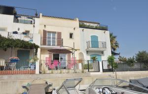 Maisons de vacances Nice home in Aigues-Mortes with 3 Bedrooms and WiFi : photos des chambres