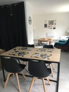 Appartements Appartement avec jardin privatif : photos des chambres