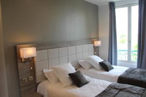 Hotels Hotel L'Esturgeon : photos des chambres