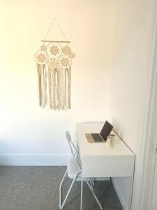Appartements F2 Bohemien au centre ville : photos des chambres