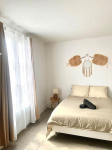 Appartements F2 Bohemien au centre ville : photos des chambres