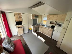 Campings LE ILO - camping la dune blanche : photos des chambres