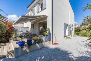 Maisons de vacances Cibelle - Charmante maison avec terrasse : photos des chambres