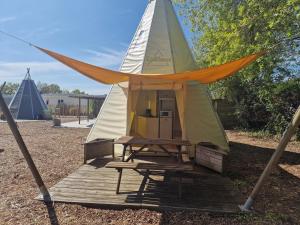 Campings Tipi Les P'tites Maisons dans la Prairie : photos des chambres