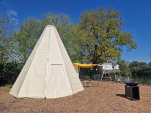 Campings Tipi Les P'tites Maisons dans la Prairie : photos des chambres
