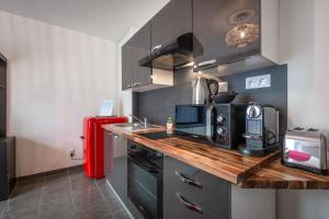 Appartements Le Nid du Mont Evrin by Plaza : photos des chambres