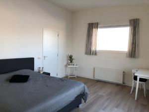 Luxe watervilla met eigen aanlegsteiger geschikt voor maximaal 6 personen in recreatiegebied de Gouden Ham in Maasbommel