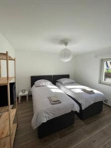 Appartements Doux Refuge avec Terrasse PARKING GRATUIT : photos des chambres