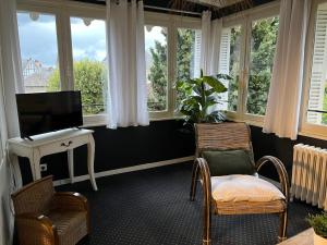 Appartements Demeure de Flore - Charmant Hotel Particulier au Coeur de Brive comprenant 7 Suites Luxueuses : photos des chambres