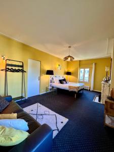 Appartements Demeure de Flore - Charmant Hotel Particulier au Coeur de Brive comprenant 7 Suites Luxueuses : photos des chambres