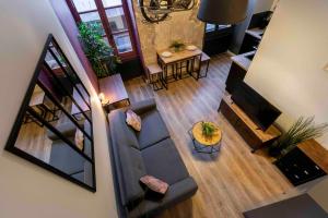 Appartements Le Terrot, Studio design, coin nuit cosy en mezzanine : photos des chambres