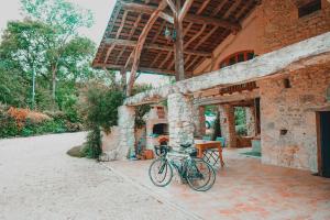 Maisons de vacances Moulin a eau et sa riviere ideal grand groupe : photos des chambres