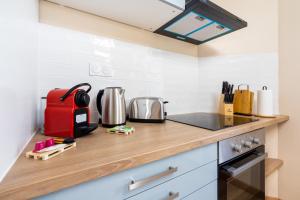 Appartements La Perle de Laigneville - Proche Parc Asterix & Chantilly, parking public gratuit, Wifi & Netflix : photos des chambres