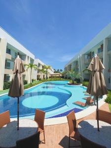 Guarajuba Porto Smeralda Village C02, térreo - GUARAJUBA TEMPORADA, viva mais de uma experiência de hospedagem conosco! 130m da praia