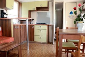 Campings Mobilhome «Aux Portes du Soleil» : photos des chambres