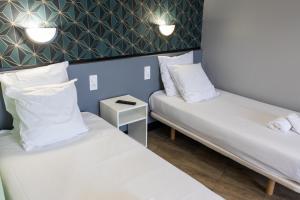 Hotels Hotel Luxia : photos des chambres