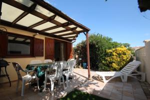 Villas Belle villa de vacances, residence TAMARIS, wifi, 2 chambres climatisees, 4 a 6 couchages, Acces payant pour les piscines -PORTIRAGNES PLAGE LRTAMA45 : photos des chambres