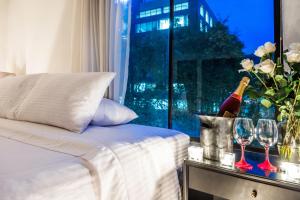 Lloyds Apartasuites Parque 93