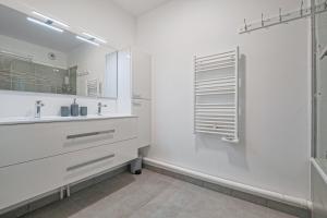 Appartements Coco - Appartement F4 a 10 minutes de Disneyland Paris : photos des chambres