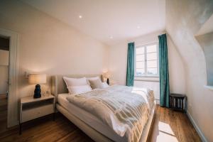 Gut Försterlay - Exklusive Boutique Apartments im historischen Winzerhaus direkt an der Mosel