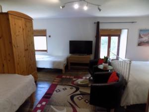 B&B / Chambres d'hotes Ianrhu : Chambre Quadruple avec Salle de Bains Privative