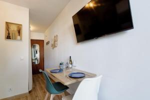 Appartements L'ecrin, Studio Cosy, MBS, Wifi, Parking, Clim : photos des chambres