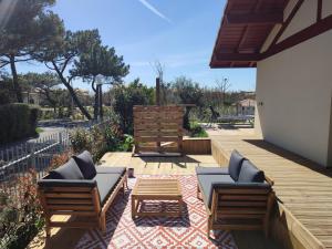 Appartements Maisonnette neuve plage et commerces a pied : photos des chambres