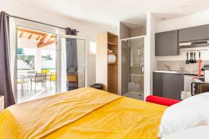 Appartements Studio neuf avec acces piscine : photos des chambres