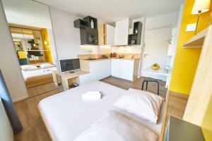 Appartements Studio Ampere - Oullins centre- Lyon : photos des chambres