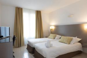 Hotels Hotel Les Lentisques : Chambre Lits Jumeaux - Vue sur Jardin