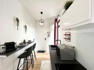 Appartements Le JOY, studio au coeur de la ville : photos des chambres