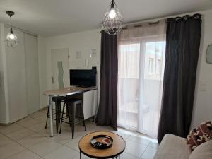 Appartements Studio cosy proche toutes commodites avec parking gratuit : photos des chambres