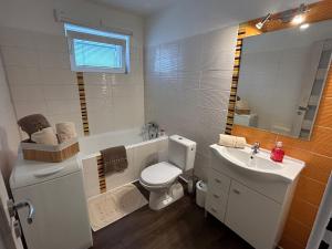 Komfortný apartmán so záhradou a súkromným parkoviskom - 24h self check-in