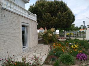 Maisons de vacances Maison avec Jardin prive : photos des chambres