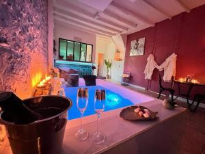 Appartements Suite romance - Jacuzzi : photos des chambres