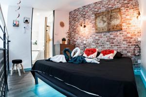 Appartements Love Loft Spa : photos des chambres