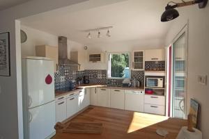 Maisons de vacances Maison entre Terre & Mer – Wifi : photos des chambres
