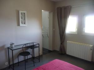 Appartements Les Amandiers : photos des chambres