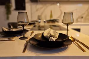 Appartements AOG PRESTIGE logement neuf avec SPA et ecran de cinema en rez de jardin : photos des chambres