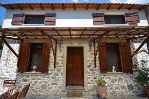 Two-storey house with loft at Agria,Volos