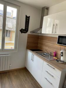 Appartements Le LH CENTRE VILLE : photos des chambres