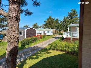 Chalets Au Soleil Couchant - Camping Bel Sito Natura 2 000 : photos des chambres