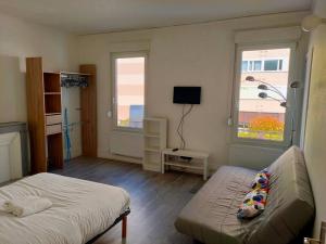 Appartements Venise - Maison avec exterieur a Reims : photos des chambres