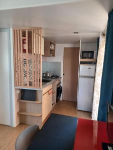 Campings Mobil-home J59 aux Sables du Midi : photos des chambres