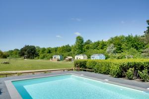 Green Tiny House with shared pool